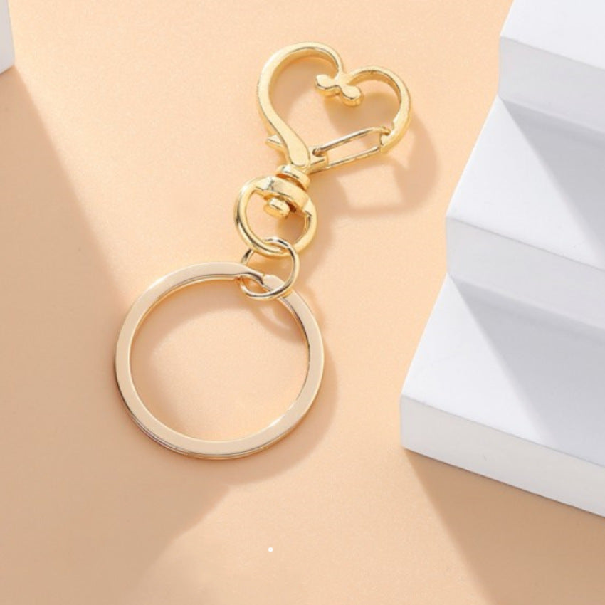 Accesorios al por mayor de llavero de metal de oro del corazón